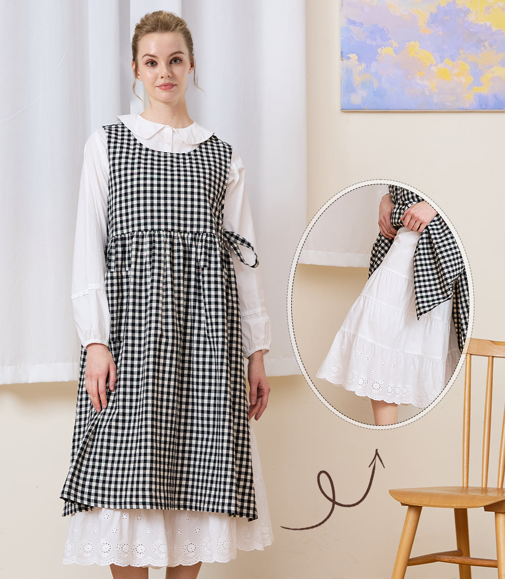 Ivory bloomers styled as an underskirt extender beneath a gingham dress to show the layered lace detail.