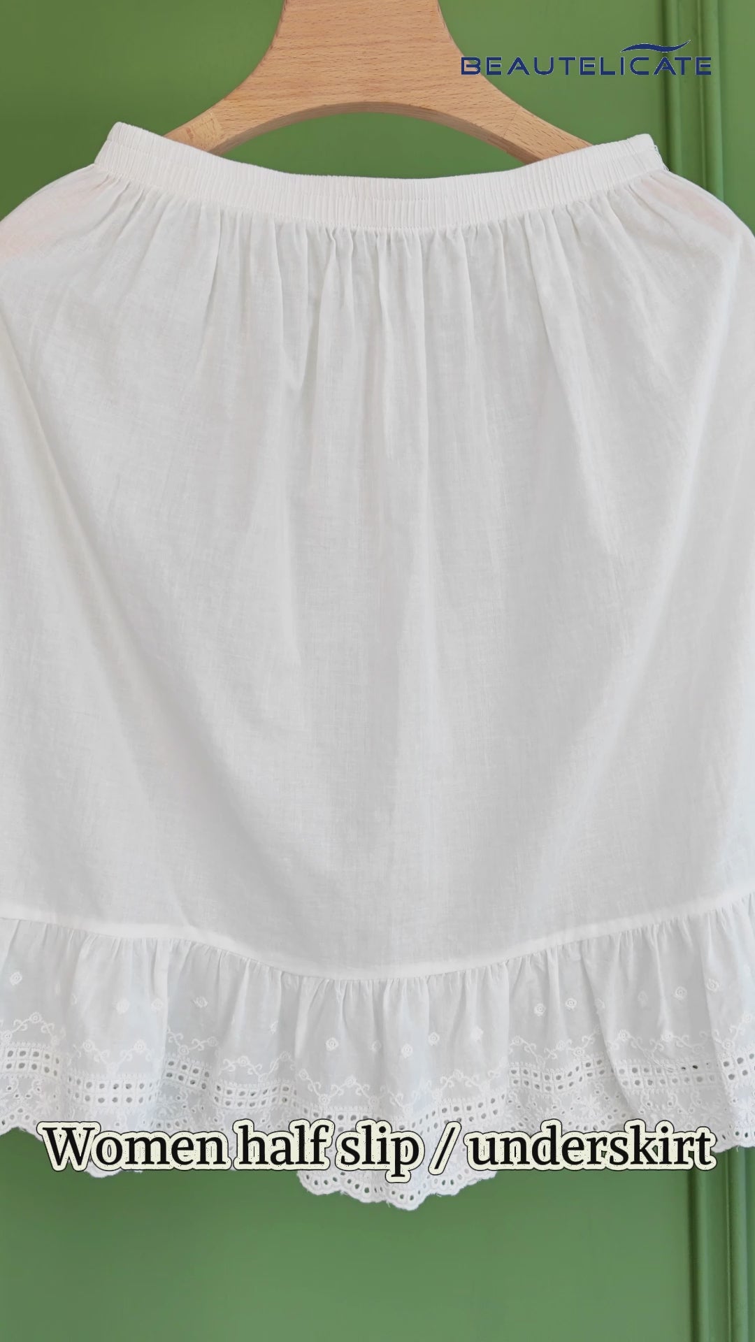 ivory vintage cotton half slip with elegant 5-inch lace trim, showing knee-length design