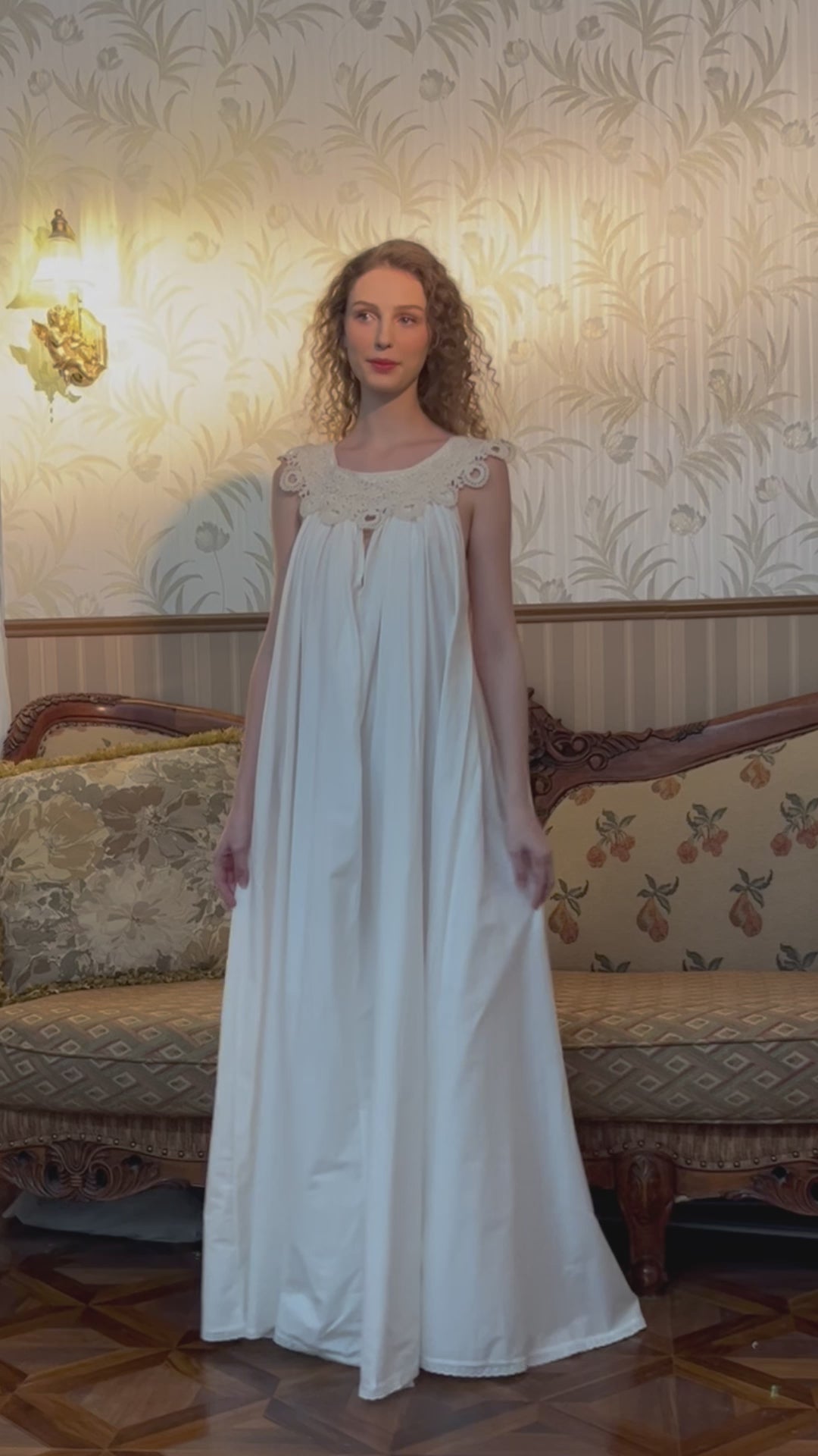 Victorian sleeveless cotton nightgown in white with elegant lace V-neck detail
