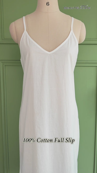Women's long cotton slip - showing knee-length design with adjustable straps