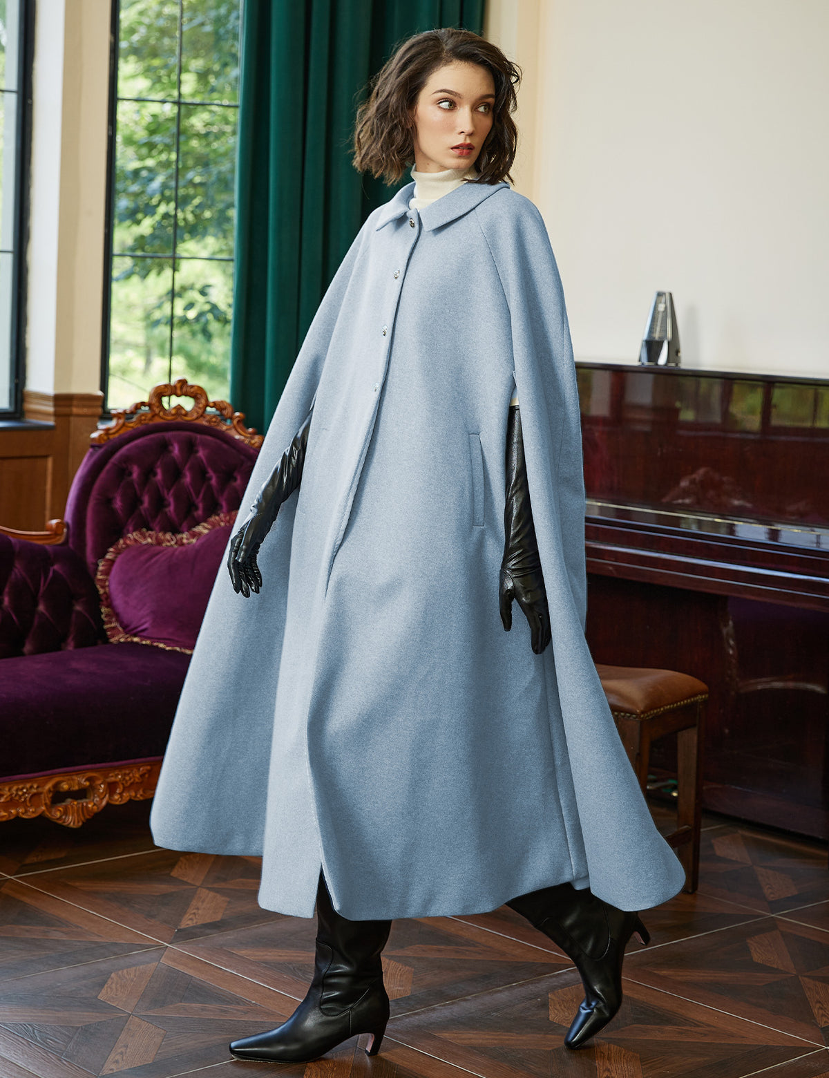 Wool blend cloak with slit sleeves and pockets - front view showing elegant winter cape design